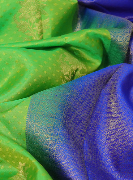 Pure kanchipuram silk saree dual shade of light green and royal blue with allover self emboss & zari buttas and zari woven border