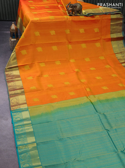 Pure kanchipuram silk saree dual shade of mango yellow and teal green with allover self emboss & zari buttas and zari woven border