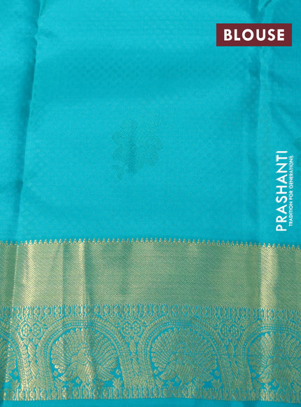 Pure kanchipuram silk saree dual shade of mango yellow and teal green with allover self emboss & zari buttas and zari woven border