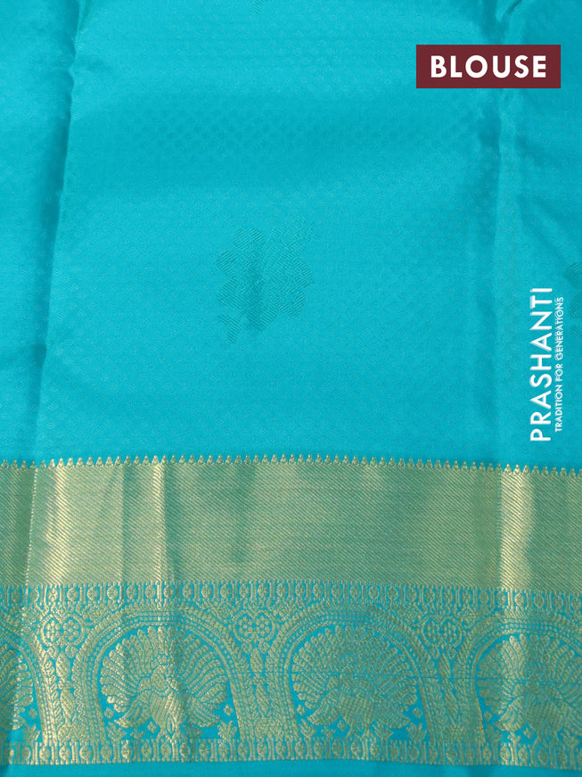 Pure kanchipuram silk saree dual shade of mango yellow and teal green with allover self emboss & zari buttas and zari woven border