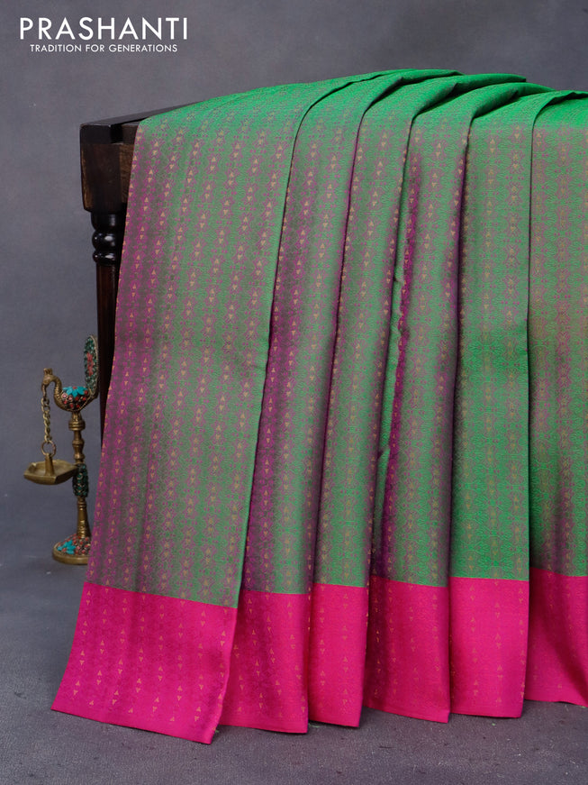 Pure kanchipuram silk saree dual shade of green and pink with allover self emboss and simple border