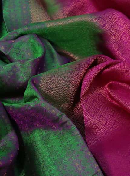 Pure kanchipuram silk saree dual shade of green and pink with allover self emboss and simple border