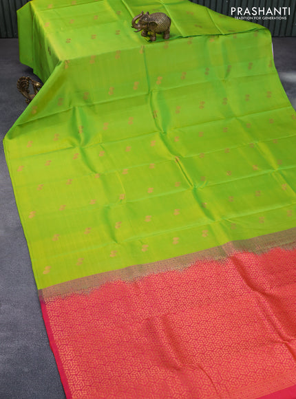 Pure kanchipuram silk saree light green and dual shade of pinkish orange with copper zari woven buttas in borderless style