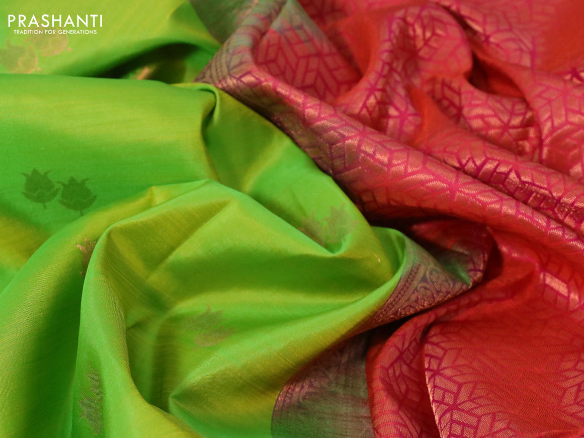 Pure kanchipuram silk saree light green and dual shade of pinkish orange with copper zari woven buttas in borderless style