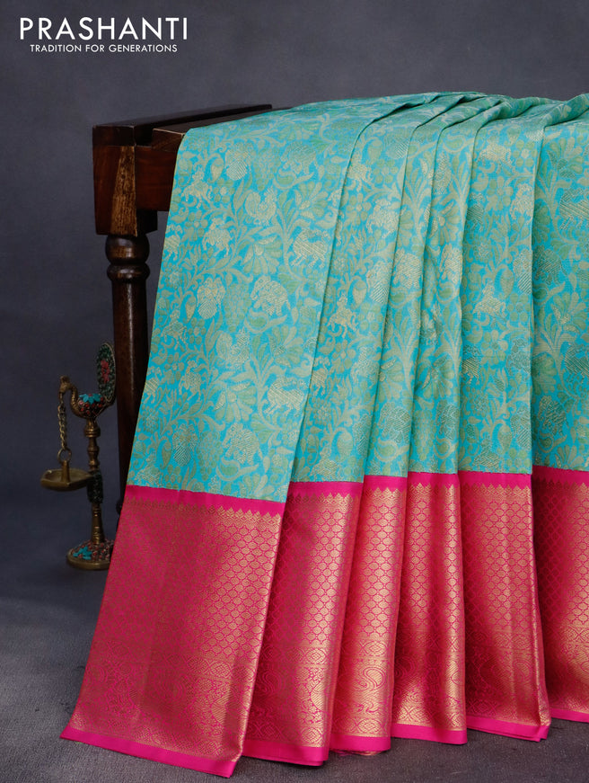 Pure kanchipuram silk saree teal blue and pink with allover zari woven brocade weaves and long zari woven border