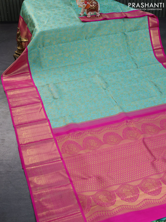 Pure kanchipuram silk saree teal blue and pink with allover zari woven brocade weaves and long zari woven border