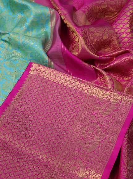 Pure kanchipuram silk saree teal blue and pink with allover zari woven brocade weaves and long zari woven border