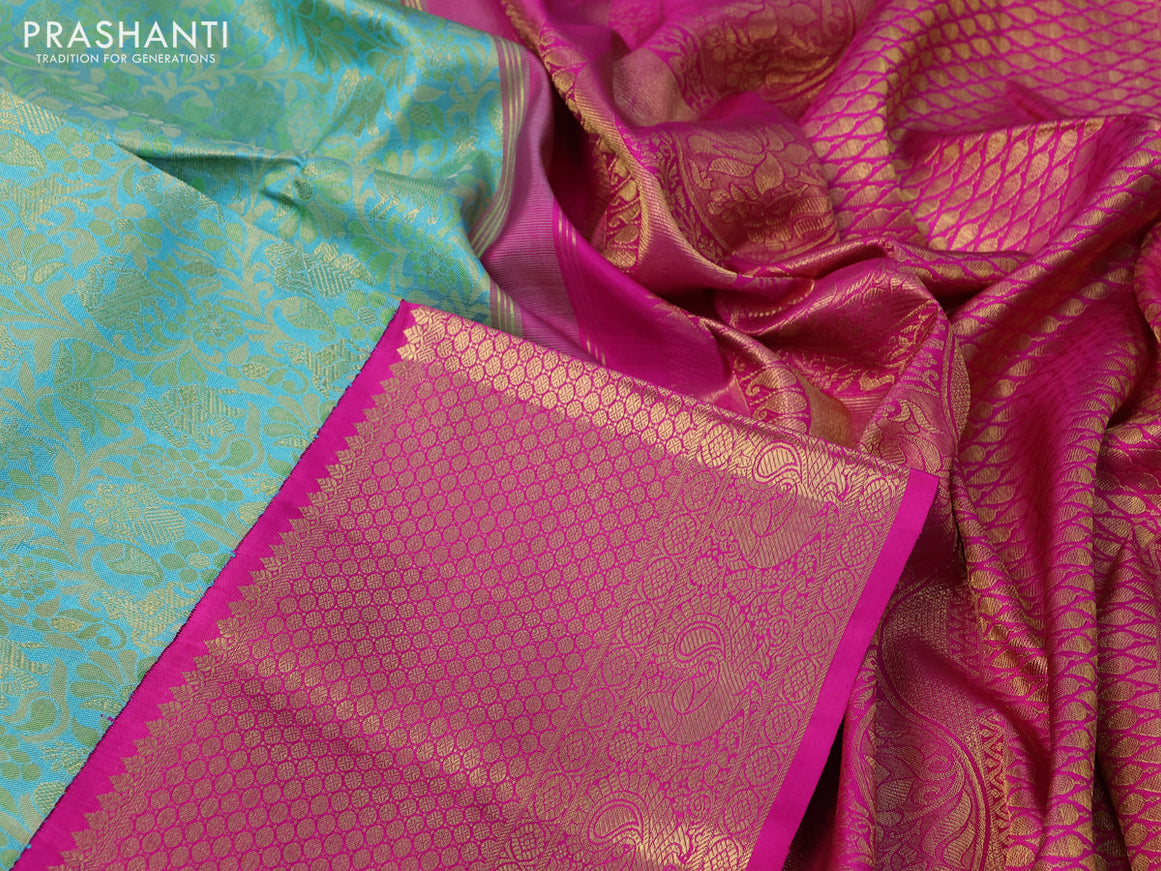 Pure kanchipuram silk saree teal blue and pink with allover zari woven brocade weaves and long zari woven border