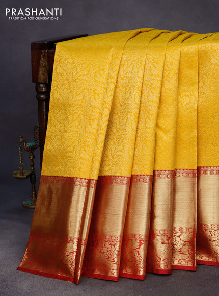 Pure kanchipuram silk saree yellow and red with allover zari woven brocade weaves and long zari woven border