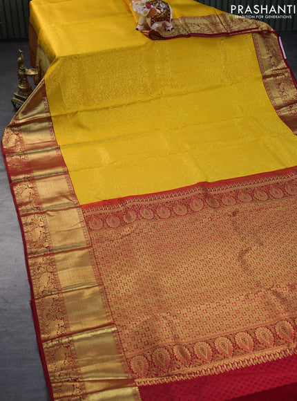 Pure kanchipuram silk saree yellow and red with allover zari woven brocade weaves and long zari woven border