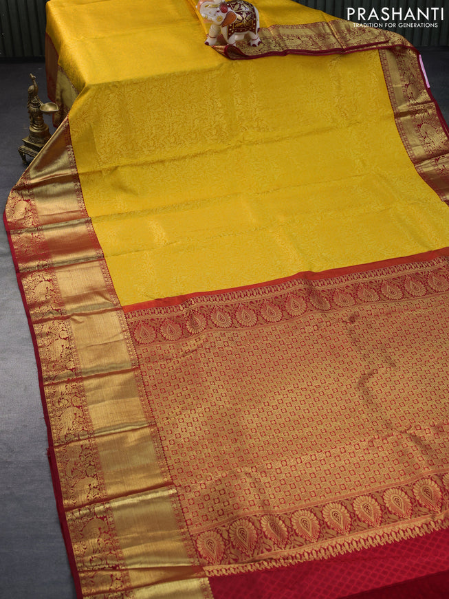 Pure kanchipuram silk saree yellow and red with allover zari woven brocade weaves and long zari woven border