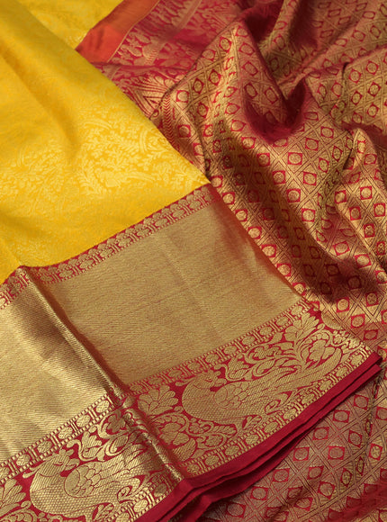 Pure kanchipuram silk saree yellow and red with allover zari woven brocade weaves and long zari woven border