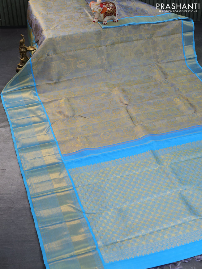 Pure kanchipuram tissue silk saree grey and light blue with allover zari woven brocade weaves and long zari woven border