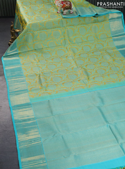 Pure kanchipuram tissue silk saree yellow and teal blue with allover zari woven brocade weaves and zari woven border