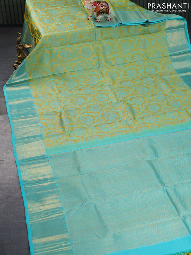 Pure kanchipuram tissue silk saree yellow and teal blue with allover zari woven brocade weaves and zari woven border