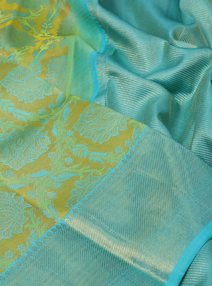 Pure kanchipuram tissue silk saree yellow and teal blue with allover zari woven brocade weaves and zari woven border