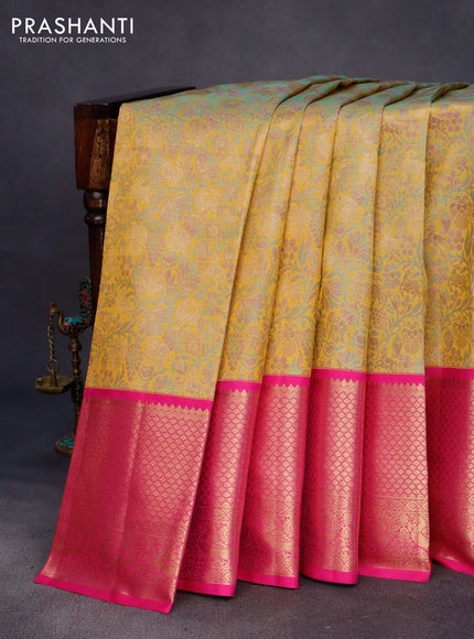 Pure kanchipuram tissue silk saree mustard shade and pink with allover zari woven brocade weaves and long annam zari woven border