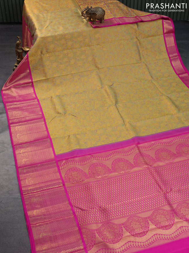 Pure kanchipuram tissue silk saree mustard shade and pink with allover zari woven brocade weaves and long annam zari woven border