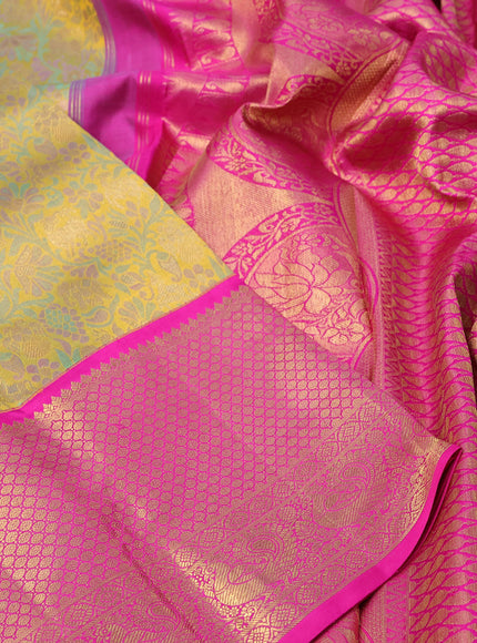 Pure kanchipuram tissue silk saree mustard shade and pink with allover zari woven brocade weaves and long annam zari woven border