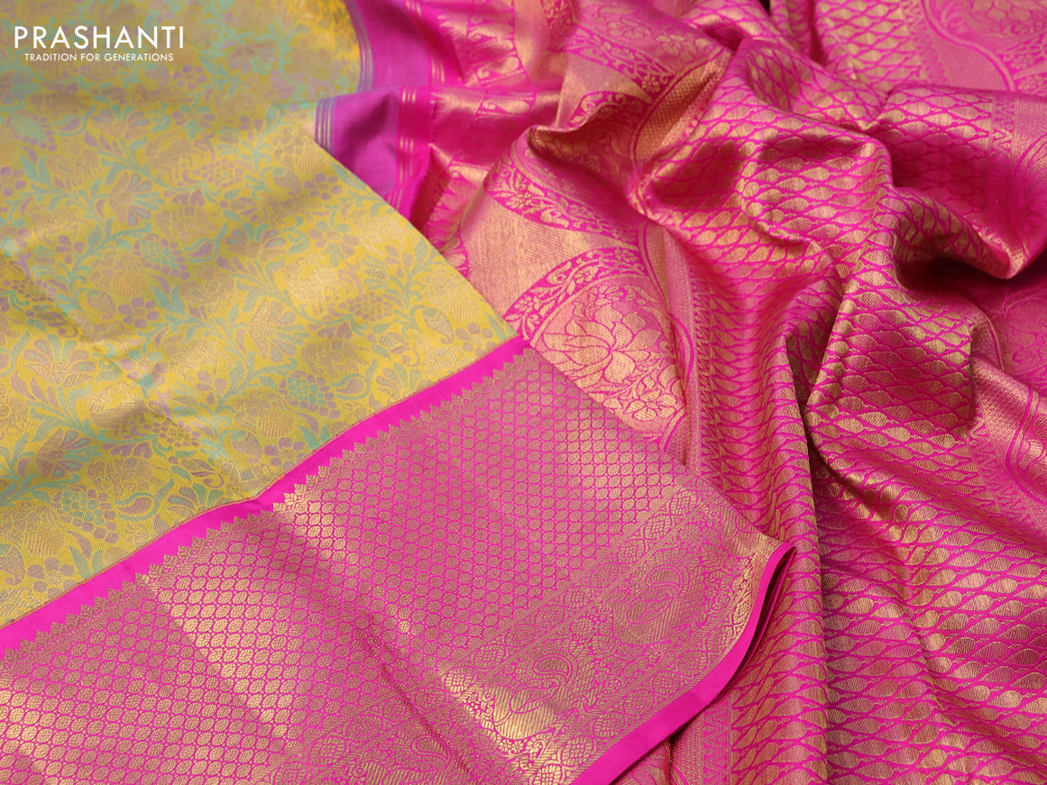 Pure kanchipuram tissue silk saree mustard shade and pink with allover zari woven brocade weaves and long annam zari woven border