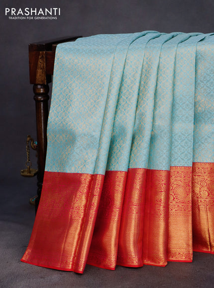 Pure kanchipuram silk saree light blue and dual shade of pink with allover zari woven brocade weaves and long annam zari woven border