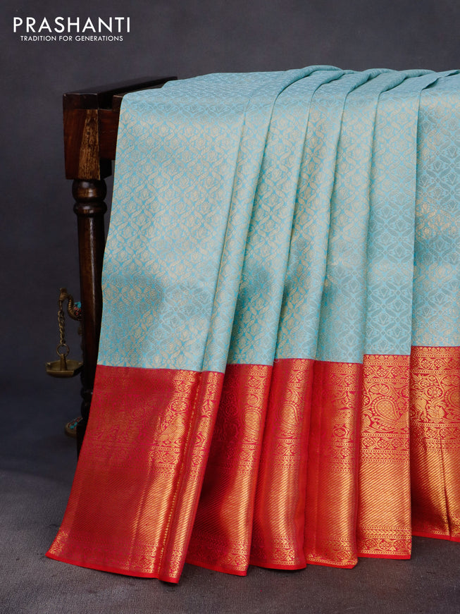 Pure kanchipuram silk saree light blue and dual shade of pink with allover zari woven brocade weaves and long annam zari woven border