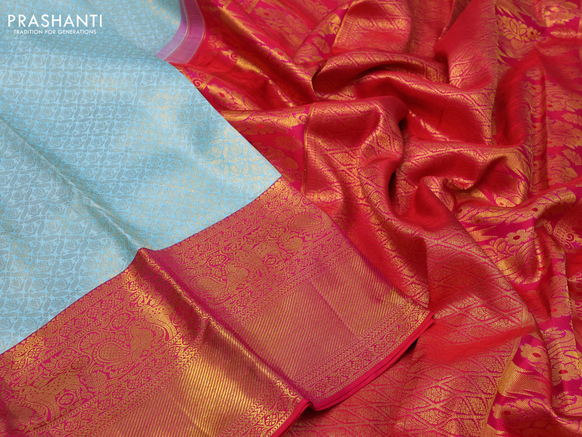 Pure kanchipuram silk saree light blue and dual shade of pink with allover zari woven brocade weaves and long annam zari woven border