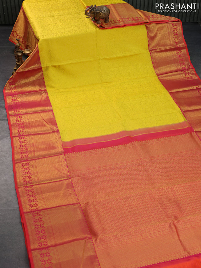 Pure kanchipuram silk saree yellow and dual shade of orange with allover zari woven brocade weaves and long rich zari woven border