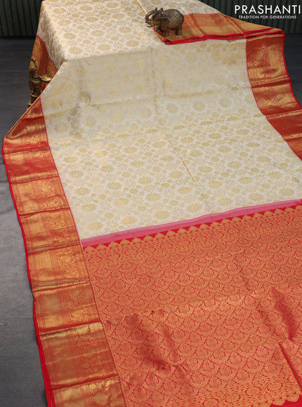 Pure kanchipuram silk saree cream and red with allover zari woven brocade weaves and rich zari woven border