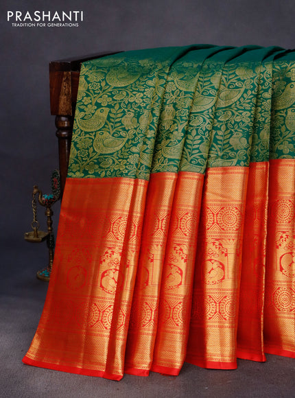 Pure kanchipuram silk saree green and red with allover zari woven brocade weaves and long rich zari woven border