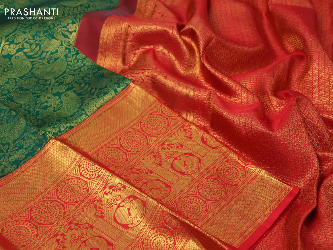 Pure kanchipuram silk saree green and red with allover zari woven brocade weaves and long rich zari woven border