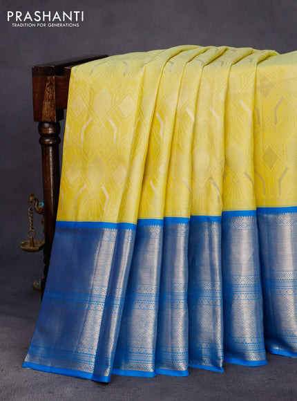 Pure kanchipuram silk saree lime yellow and cs blue with allover zari weaves and long zari woven border