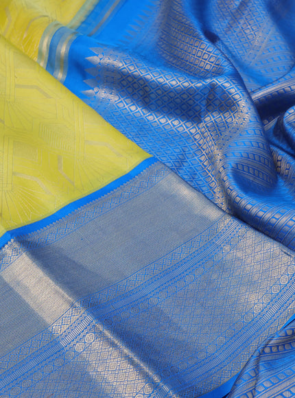 Pure kanchipuram silk saree lime yellow and cs blue with allover zari weaves and long zari woven border