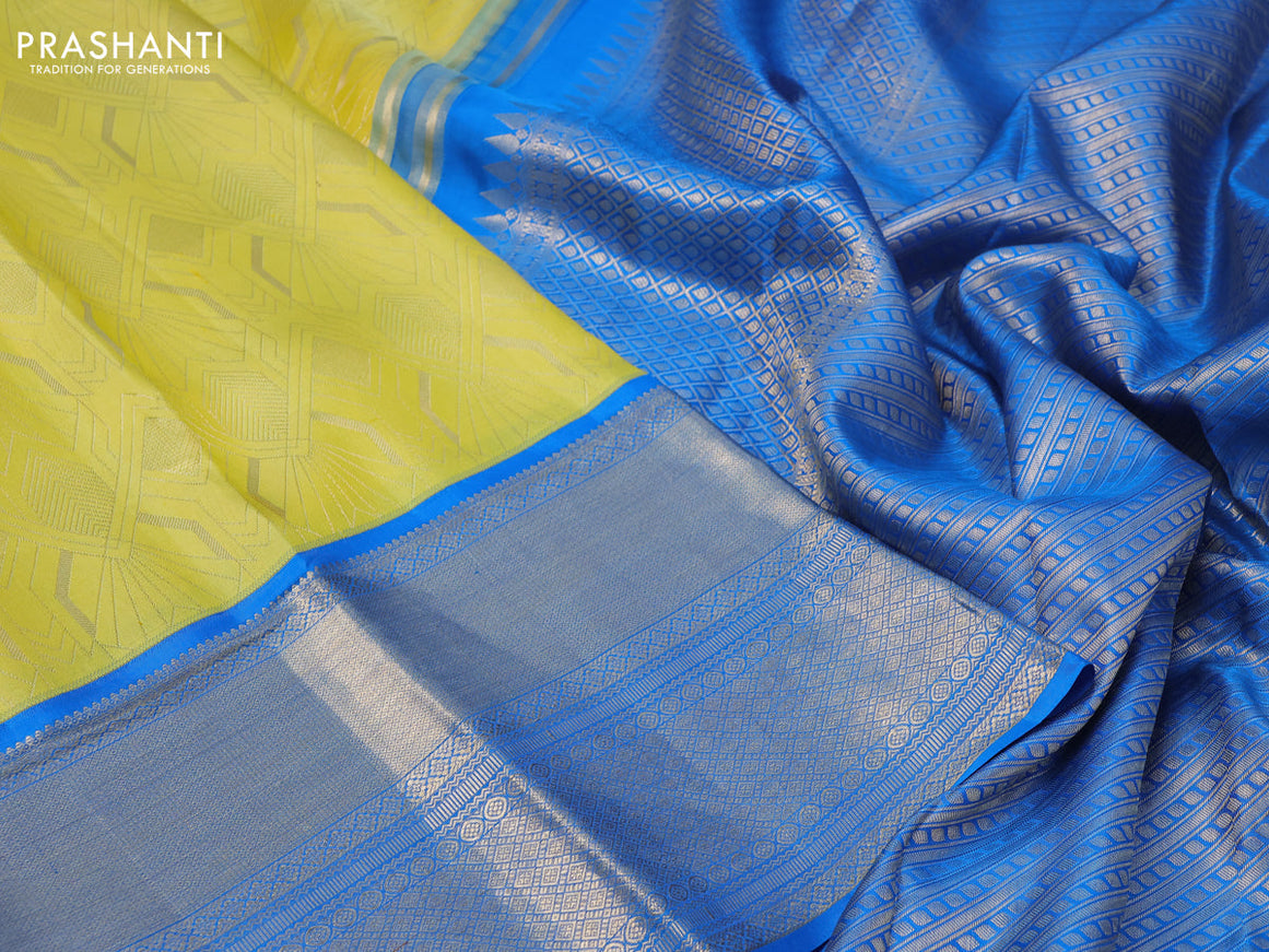 Pure kanchipuram silk saree lime yellow and cs blue with allover zari weaves and long zari woven border