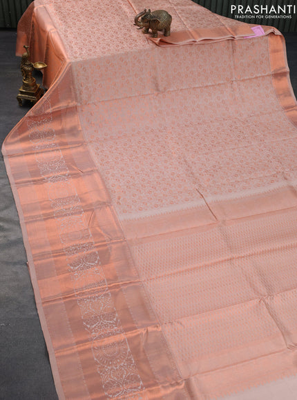 Pure kanchipuram silk saree beige with allover copper zari weaves and long copper zari woven border