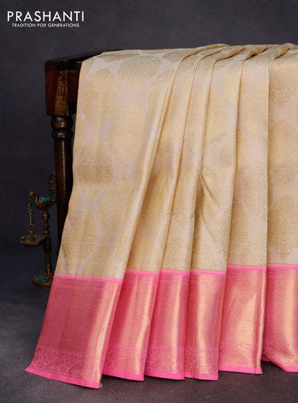 Pure kanchipuram silk saree cream and candy pink with allover zari woven brocade weaves and rich zari woven border