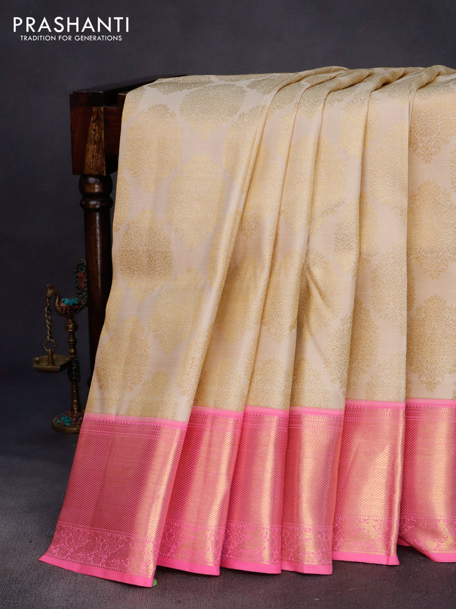 Pure kanchipuram silk saree cream and candy pink with allover zari woven brocade weaves and rich zari woven border