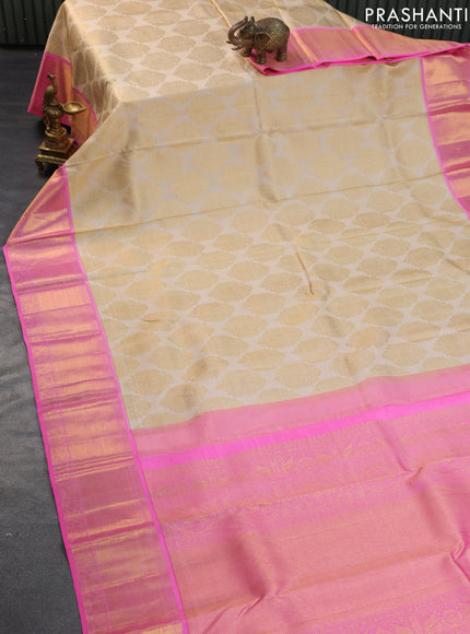 Pure kanchipuram silk saree cream and candy pink with allover zari woven brocade weaves and rich zari woven border