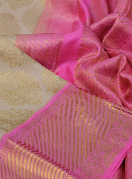 Pure kanchipuram silk saree cream and candy pink with allover zari woven brocade weaves and rich zari woven border