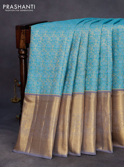 Pure kanchipuram silk saree pastel blue and grey with allover zari woven brocade weaves and long rich zari woven border