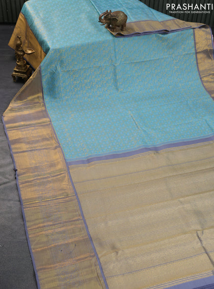 Pure kanchipuram silk saree pastel blue and grey with allover zari woven brocade weaves and long rich zari woven border