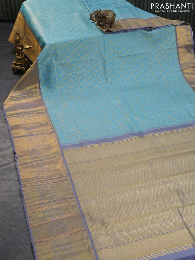 Pure kanchipuram silk saree pastel blue and grey with allover zari woven brocade weaves and long rich zari woven border