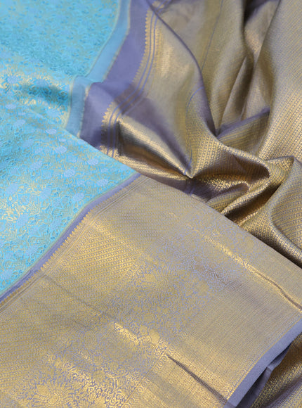 Pure kanchipuram silk saree pastel blue and grey with allover zari woven brocade weaves and long rich zari woven border