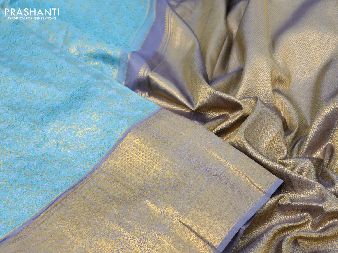 Pure kanchipuram silk saree pastel blue and grey with allover zari woven brocade weaves and long rich zari woven border