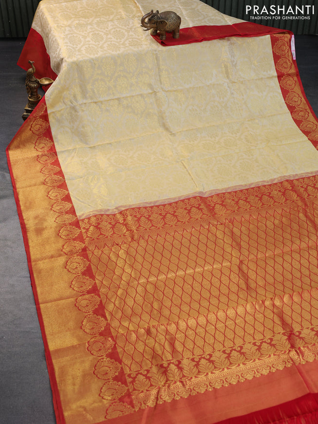 Pure kanchipuram silk saree cream and red with allover zari woven brocade weaves and long rich zari woven border