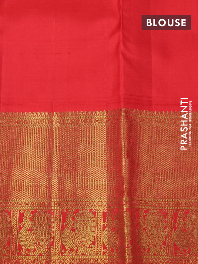 Pure kanchipuram silk saree black and orange with annam zari woven buttas and long zari woven korvai border