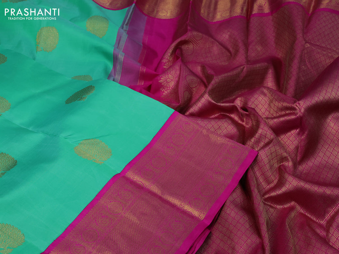 Pure kanchipuram silk saree teal green shade and pink with zari woven buttas and long zari woven korvai border