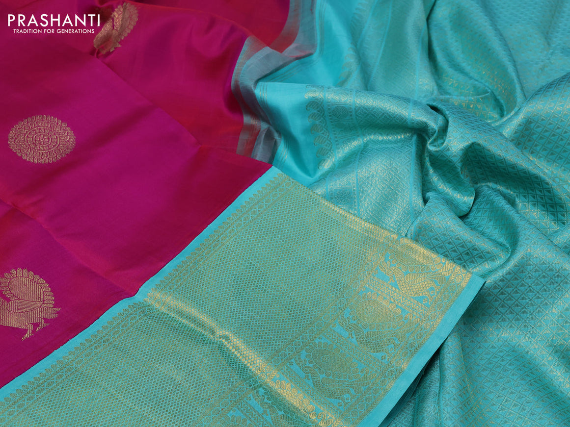 Pure kanchipuram silk saree dual shade of pink and teal blue with annam zari woven buttas and long zari woven korvai border