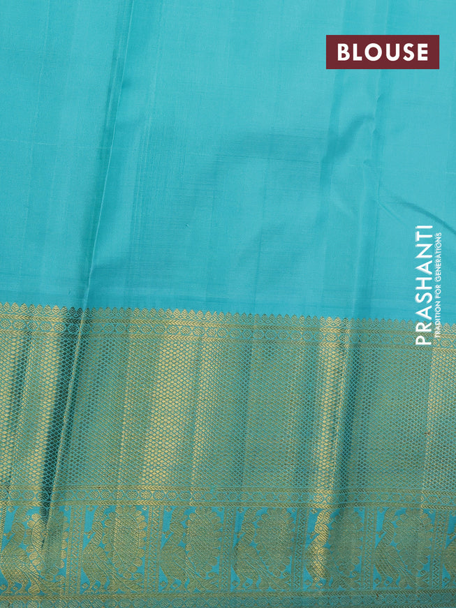 Pure kanchipuram silk saree dual shade of pink and teal blue with annam zari woven buttas and long zari woven korvai border