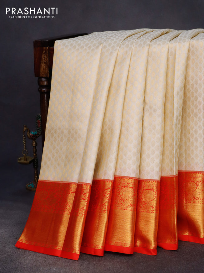 Pure kanchipuram silk saree cream and red with allover zari woven butta weaves and rich annam zari woven border